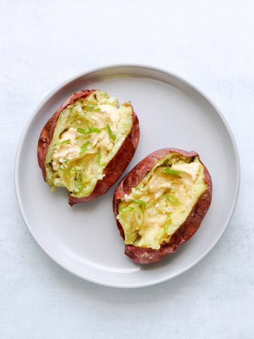 two roasted Japanese sweet potatoes with miso-butter and scallion