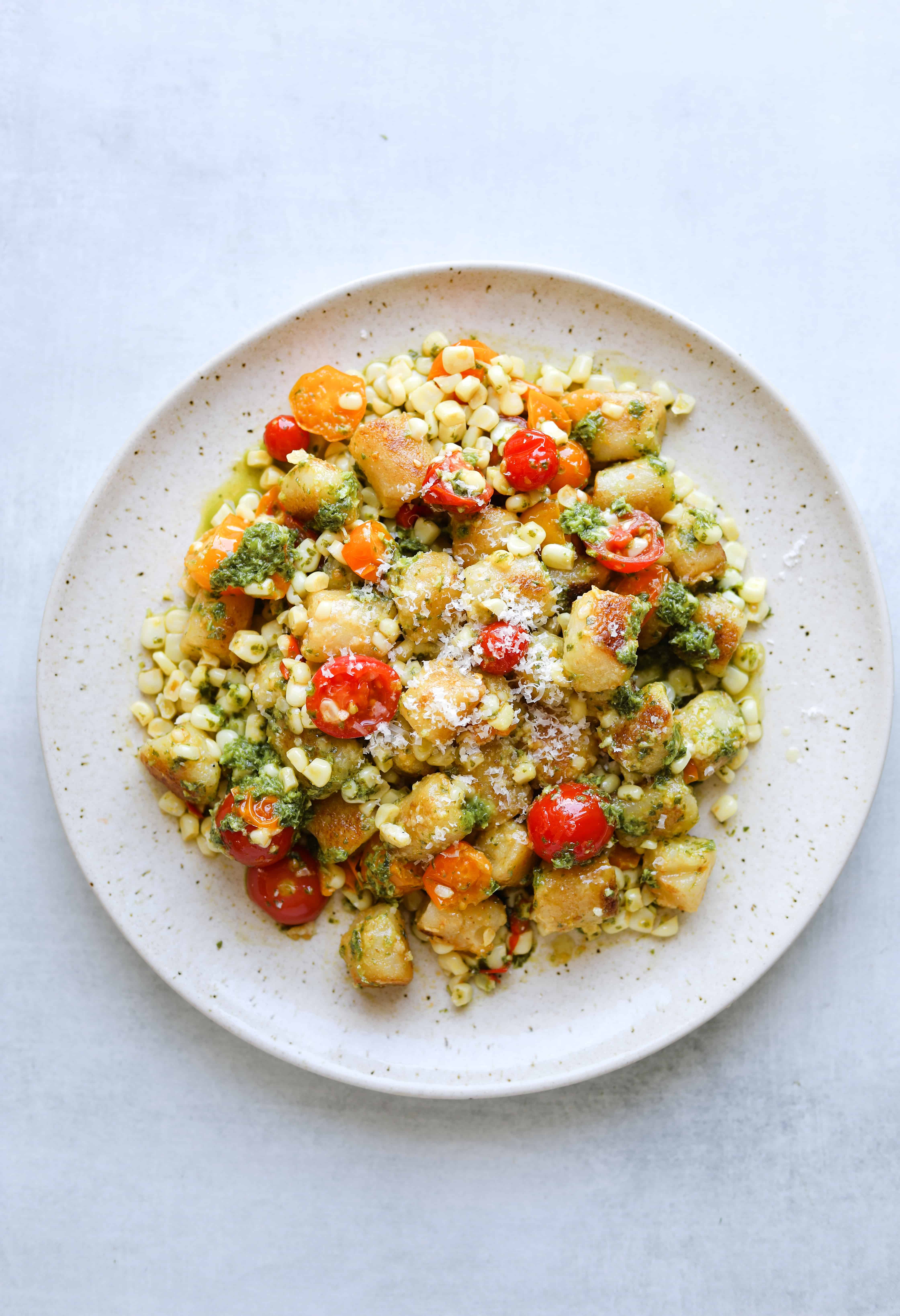 Cauliflower Gnocchi with Basil Pesto & Blistered Tomatoes