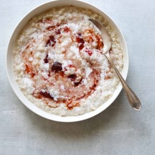 Creamy Coconut Brown Rice Porridge in a White Bowl