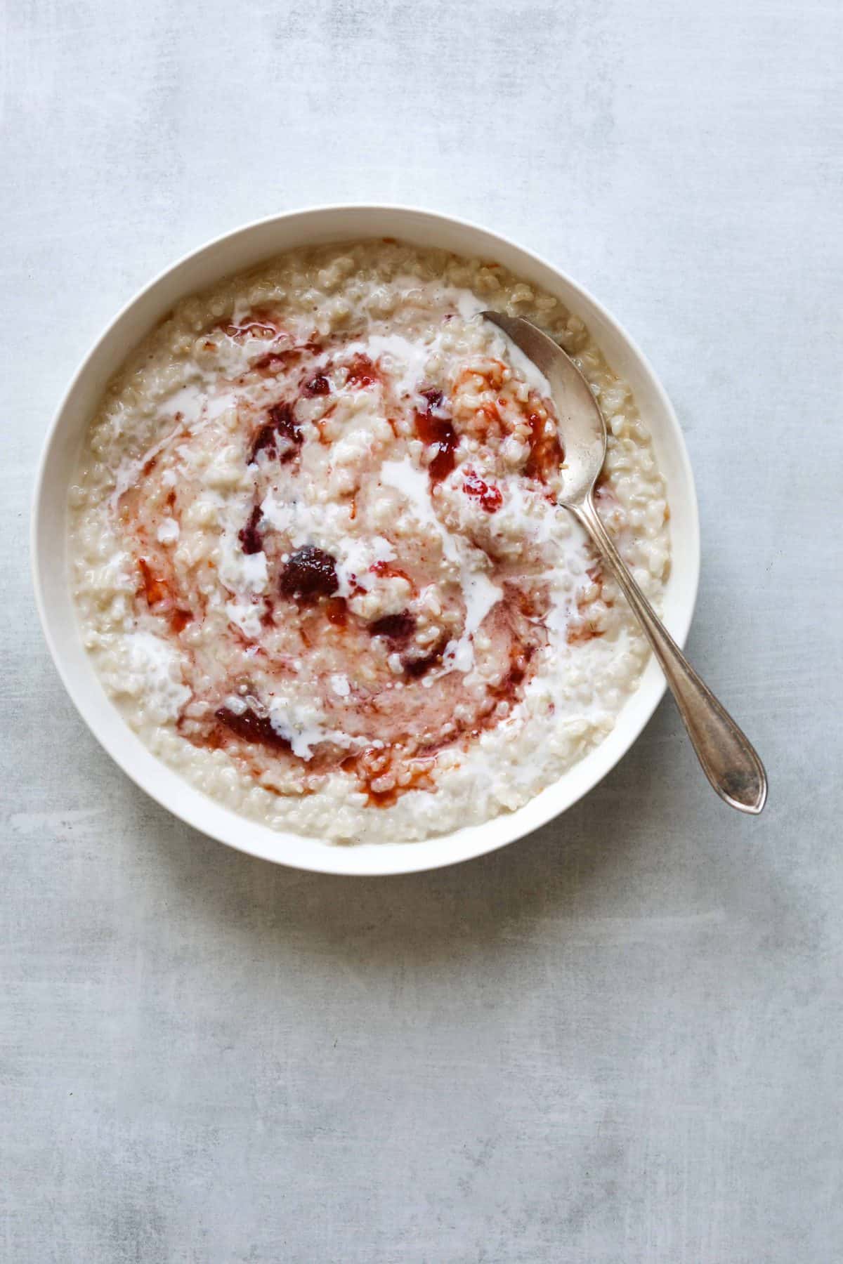 Creamy Coconut Brown Rice Porridge in a White Bowl