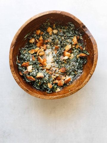 The Perfect Kale Caesar Salad in a wooden bowl
