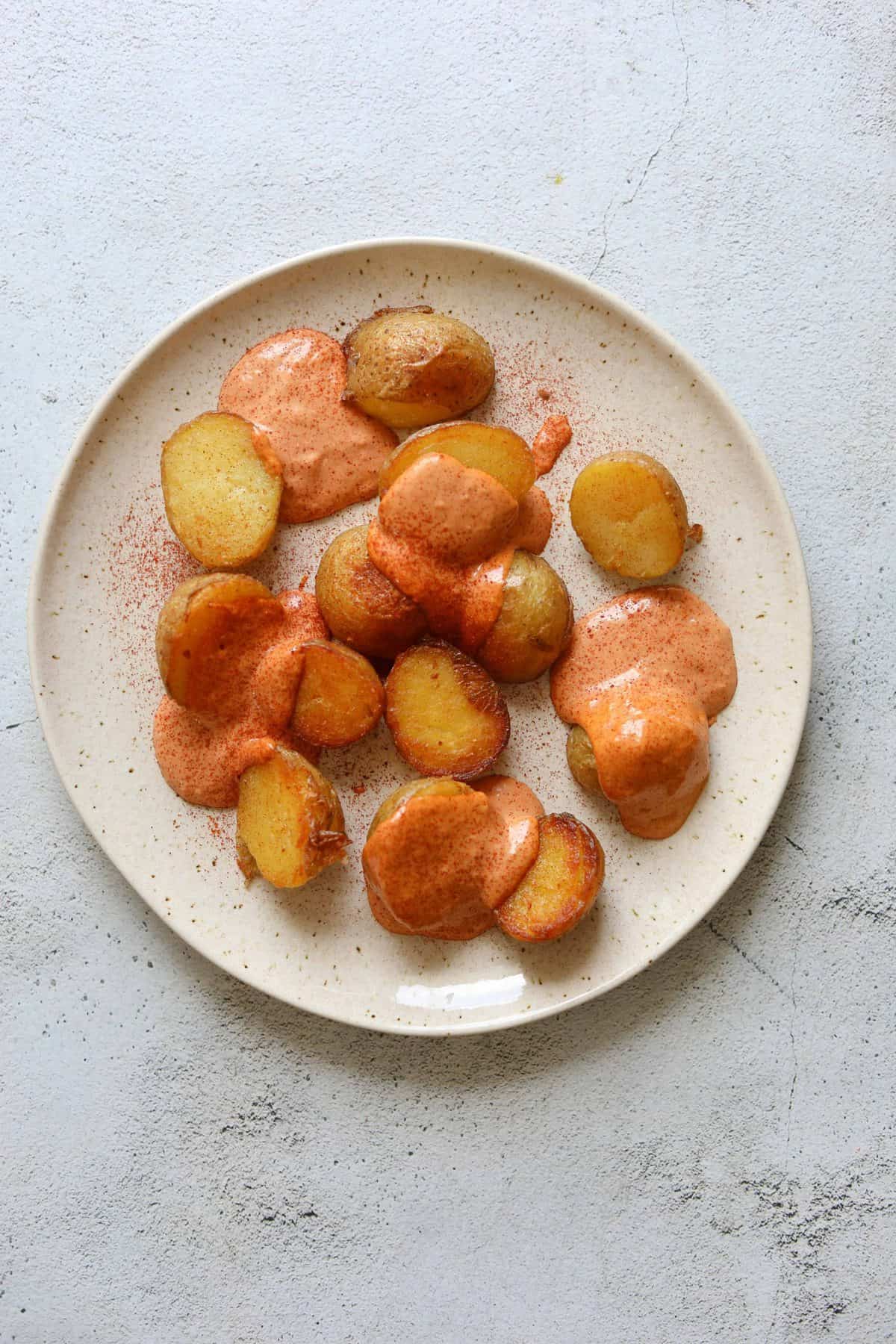Patatas Bravas on a Plate with Smokey Tomato Aioli