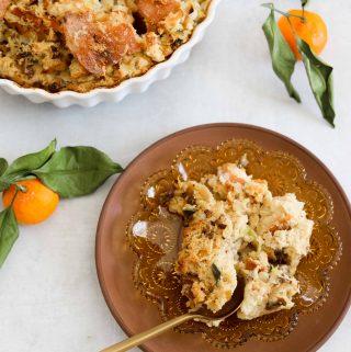 Savory Bread Pudding with Sausage + Sage being served on small brown plates.