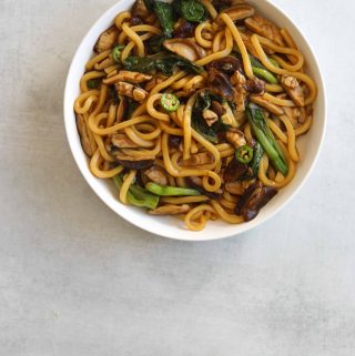 Udon Noodle Stir Fry in a white bowl