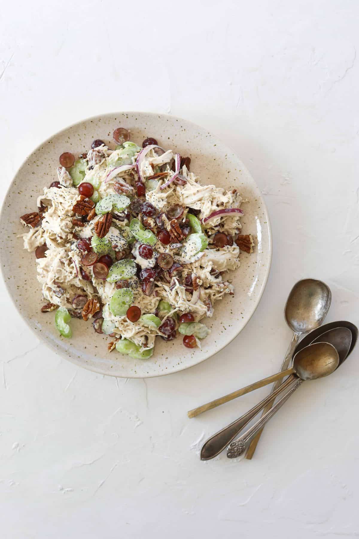Sonoma Chicken Salad on a plate with grapes, pecans and celery