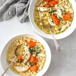 two bowls of chicken noodle soup
