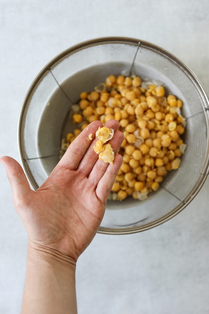 cooked and drained chickpeas in a colander