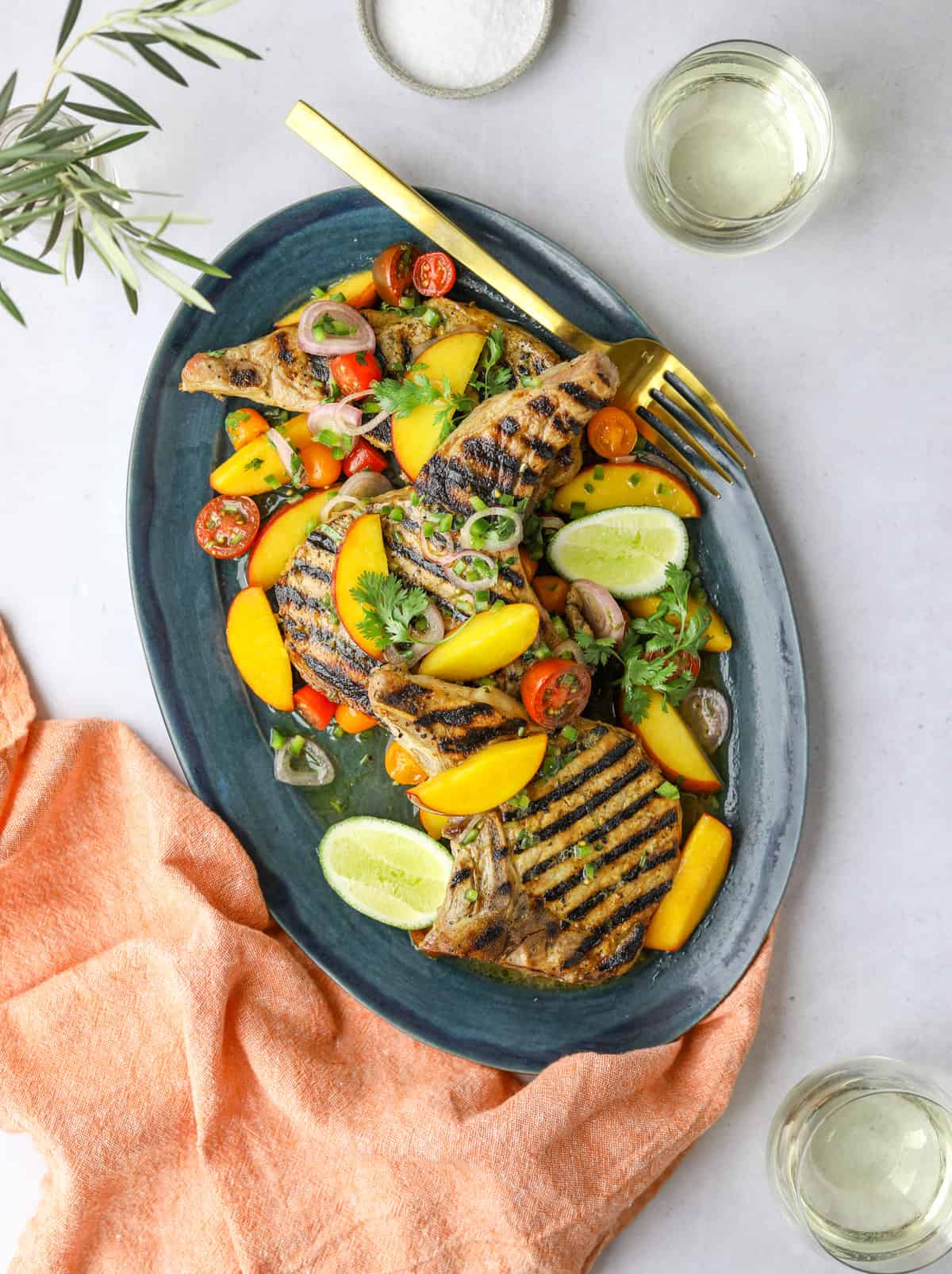 https://cravingcalifornia.com/wp-content/uploads/2021/06/Grilled-Pork-with-Peaches-and-Jalapen%CC%83o-Salsa-6.jpg