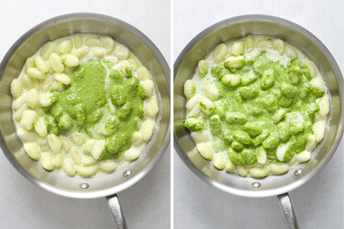 Two saute pans with gnocchi, cream and green pesto sauce on a light blue background.