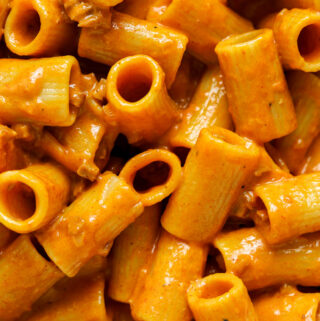 rigatoni pasta coated in a creamy tomato sauce with chorizo.