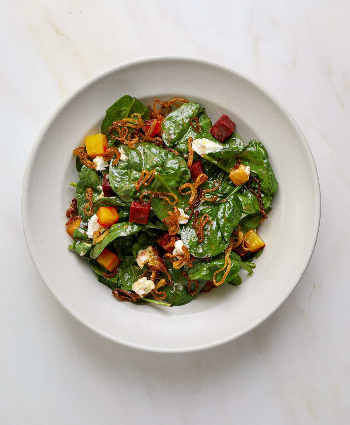 Warm Spinach Salad with Roasted Beets, Goat Cheese and Crispy Shallots