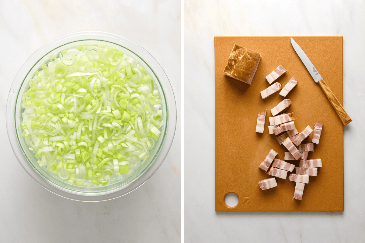 Left: a bowl of chopped leeks in water. Right: s slab of bacon on a cutting board with a knife.