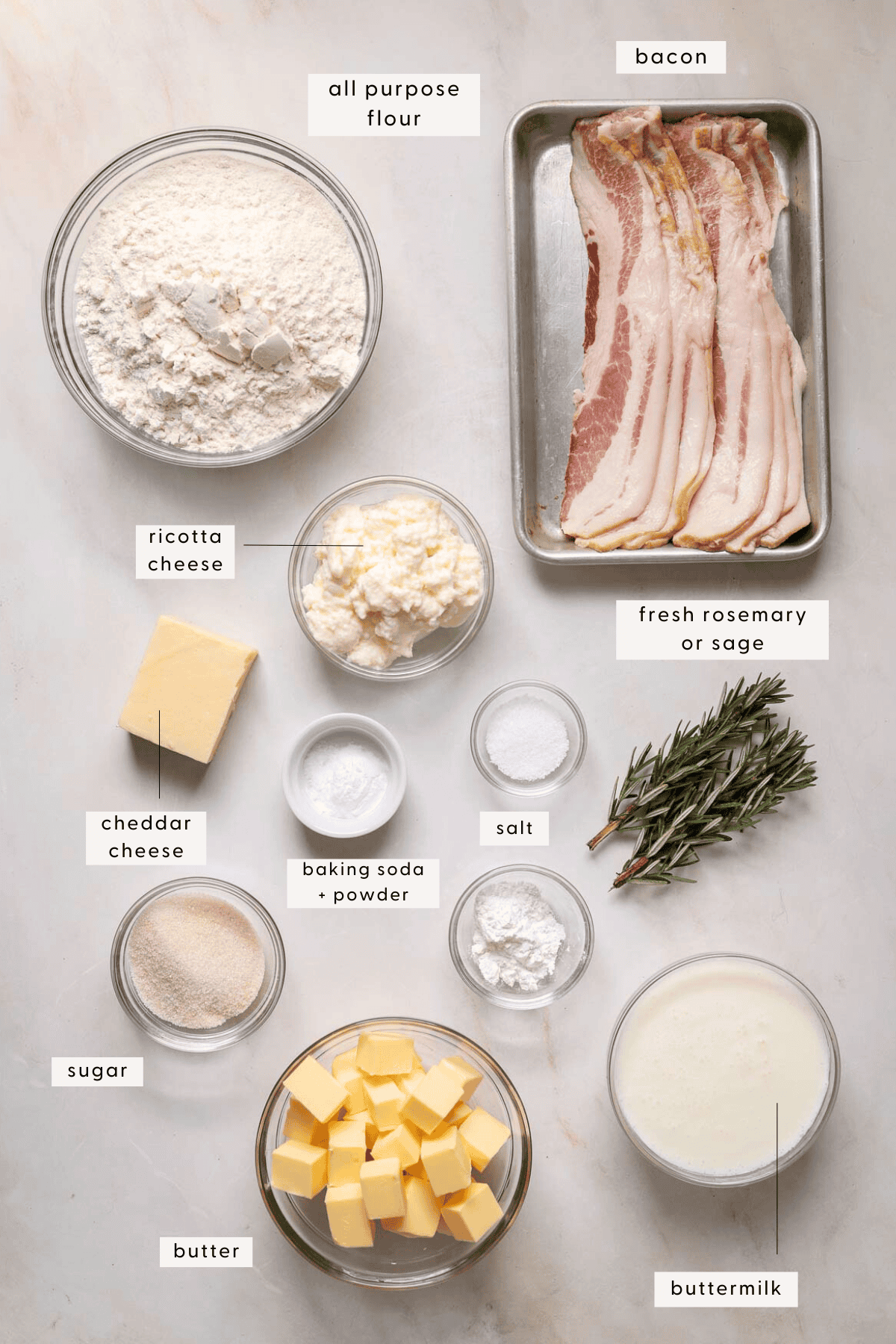 Recipe ingredients individually portioned into small bowls; flour, buttermilk, baking powder etc.